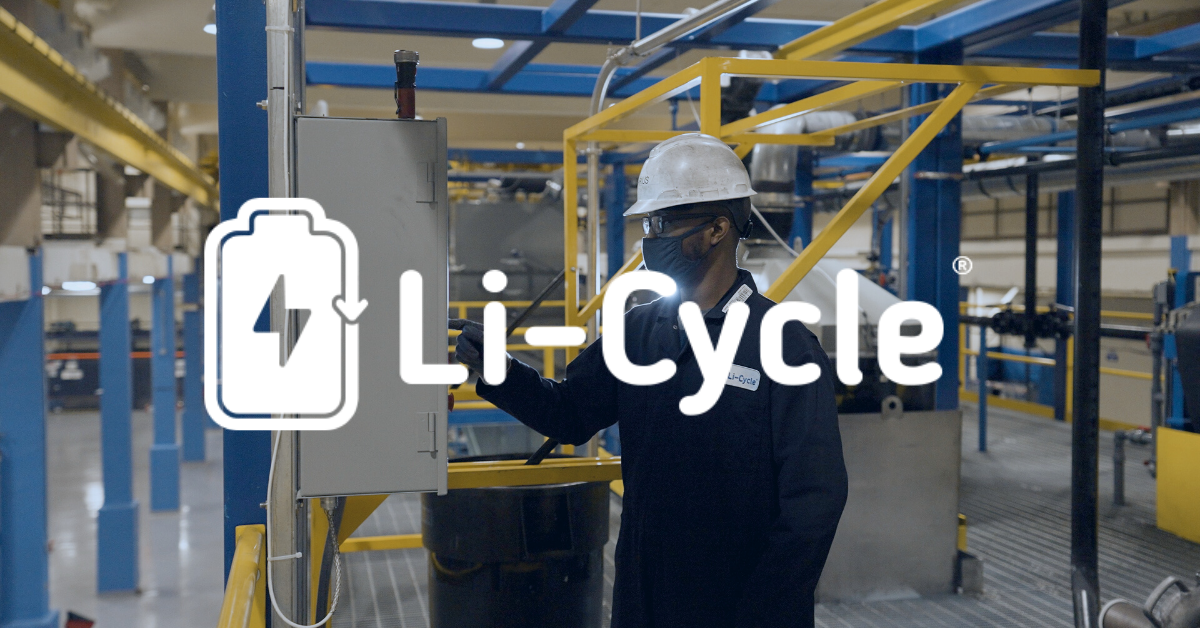 Li-Cycle logo overpaid on photo of Li-Cycle employee managing system at Spoke facility