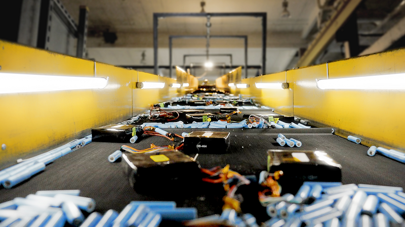 Li-ion batteries on a conveyor belt at Li-Cycle's Rochester Spoke